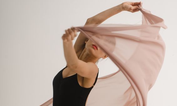 Our team image of contemporary dancer with sheer fabric